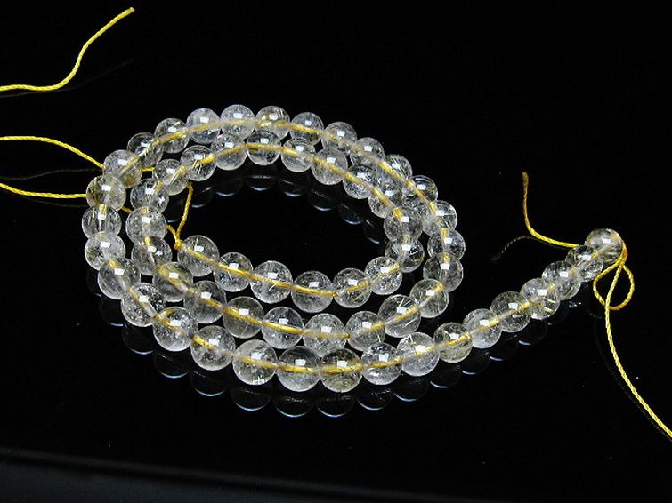 ゴールドタイチンルチル一連 7mm ビーズ [t320-3691] 1枚目