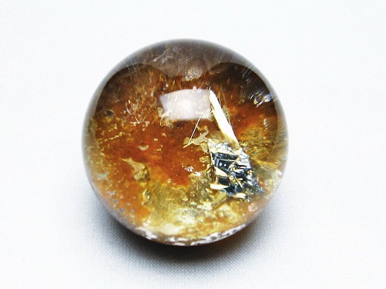 天然石 ゴールドタイチンルチル入り水晶丸玉42mm[T637-4417] 1枚目