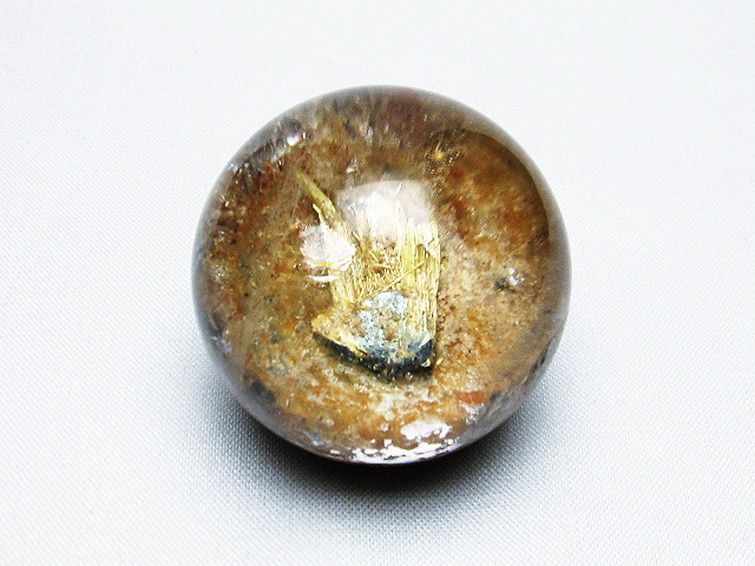 天然石 ゴールドタイチンルチル入り水晶丸玉41mm[T637-4438] 1枚目